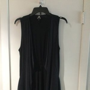 Boho style vest in charcoal gray. Drape front